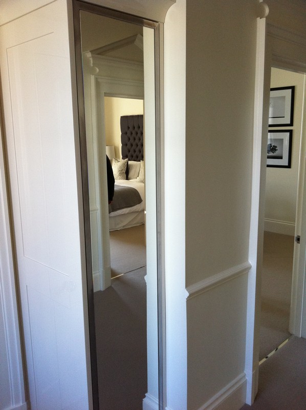 Full-length wardrobe mirror fitted in Hornsey home