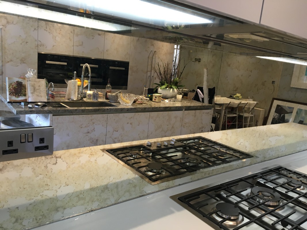 Mirror glass splashback in Hornsey luxury kitchen