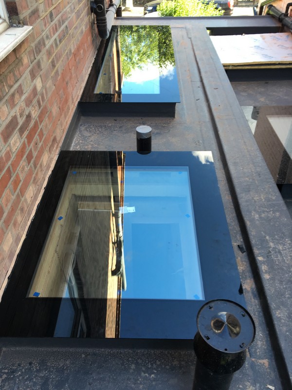 Multiple flat roof skylights on extension in Hornsey